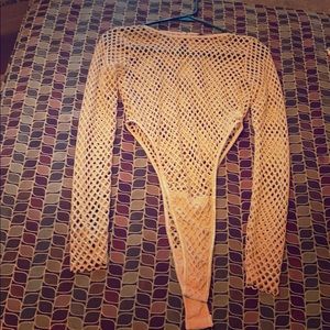 Nude fishnet bodysuit